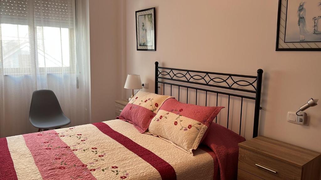 Posteľ alebo postele v izbe v ubytovaní APARTAMENTO A PIE DE PLAYA