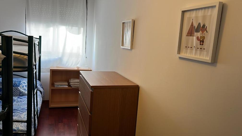 Posteľ alebo postele v izbe v ubytovaní APARTAMENTO A PIE DE PLAYA