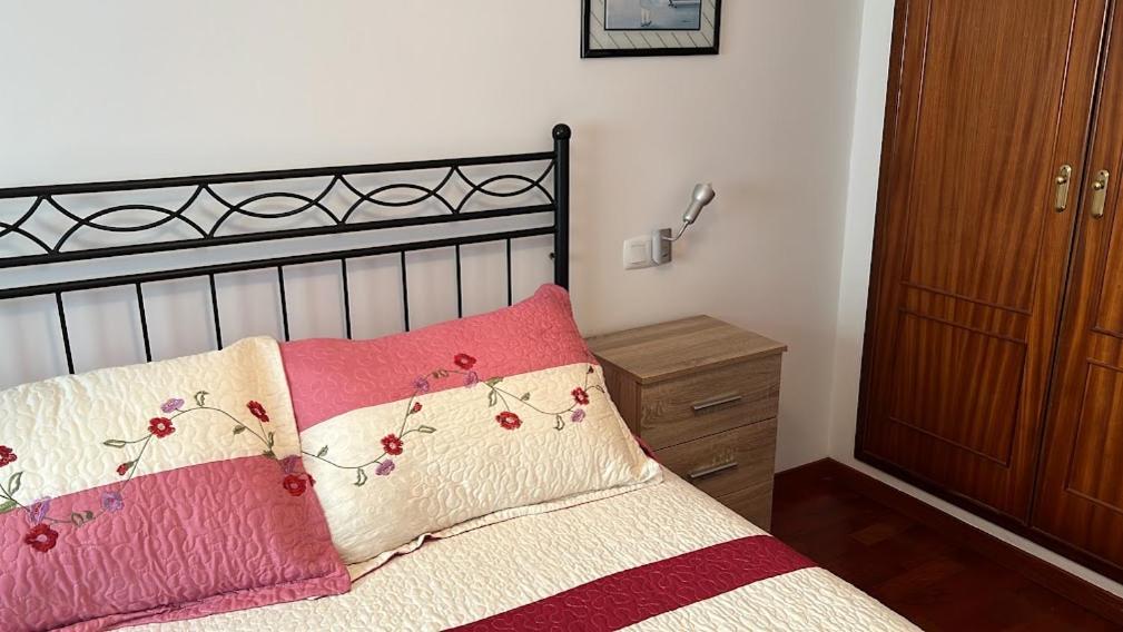 Posteľ alebo postele v izbe v ubytovaní APARTAMENTO A PIE DE PLAYA