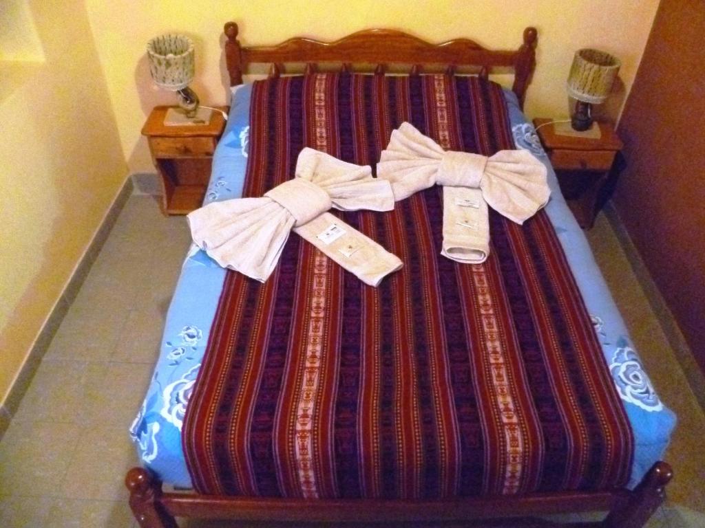 Postel nebo postele na pokoji v ubytování Hostal La Soñada