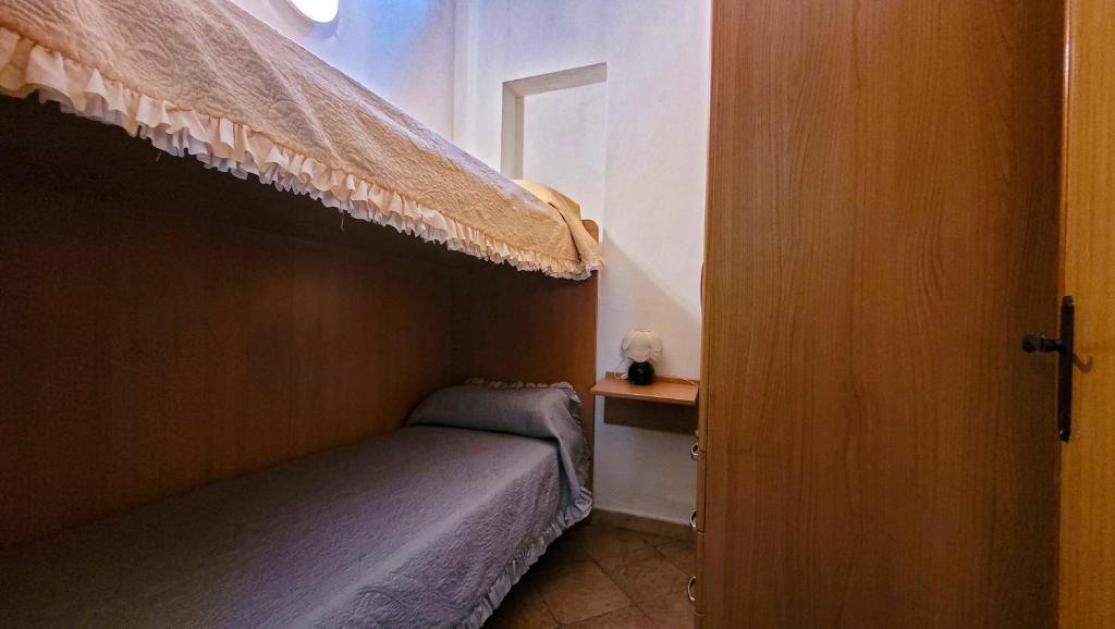 Postel nebo postele na pokoji v ubytování Residenza Le Orchidee