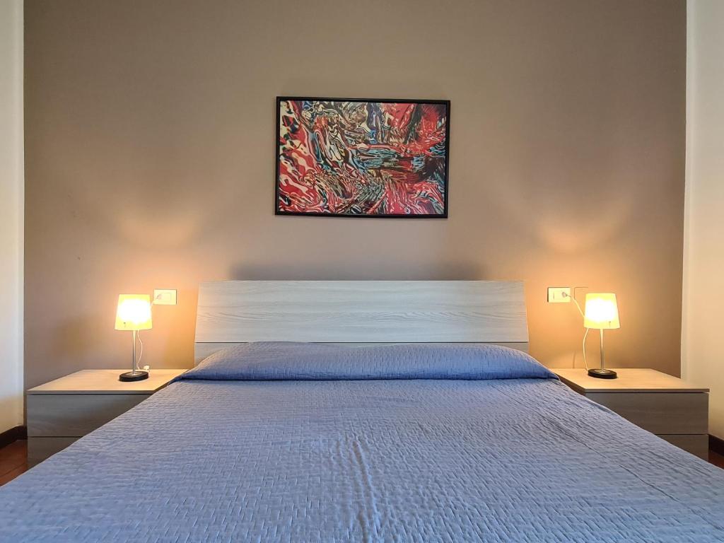 Posteľ alebo postele v izbe v ubytovaní Caletta Apartments