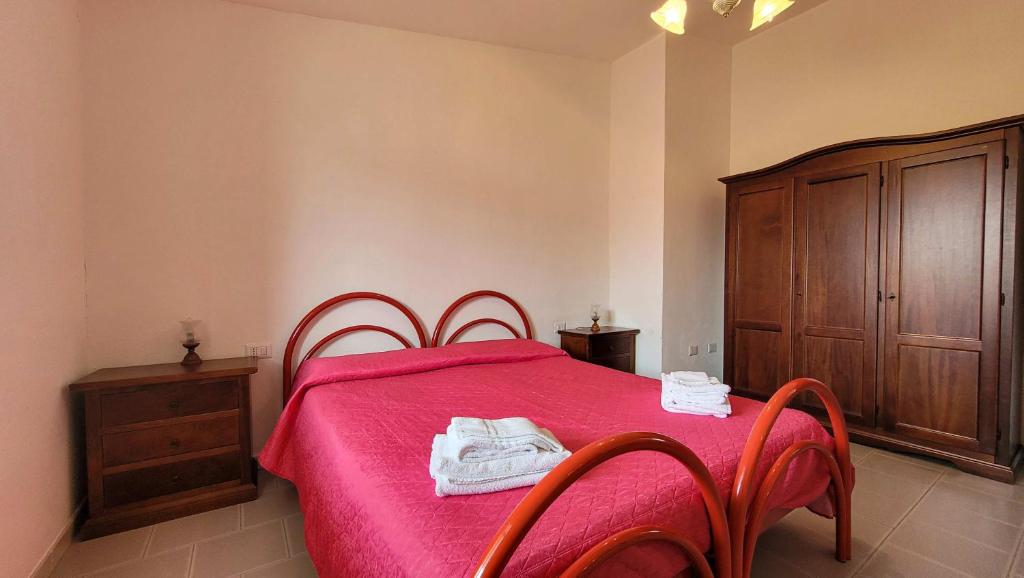 Postel nebo postele na pokoji v ubytování Residenza Le Orchidee