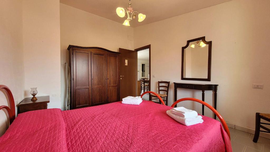 Postel nebo postele na pokoji v ubytování Residenza Le Orchidee