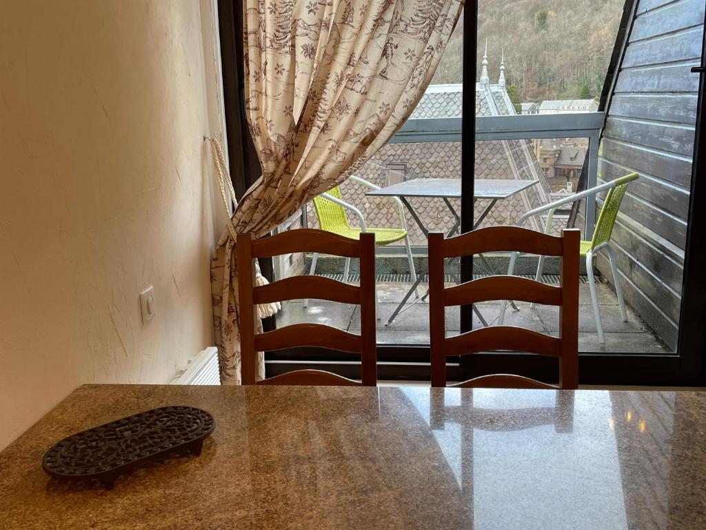 Posedenie v ubytovaní Appartements bien situés avec terrasse