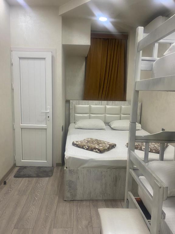 Postel nebo postele na pokoji v ubytování HOTEL N1