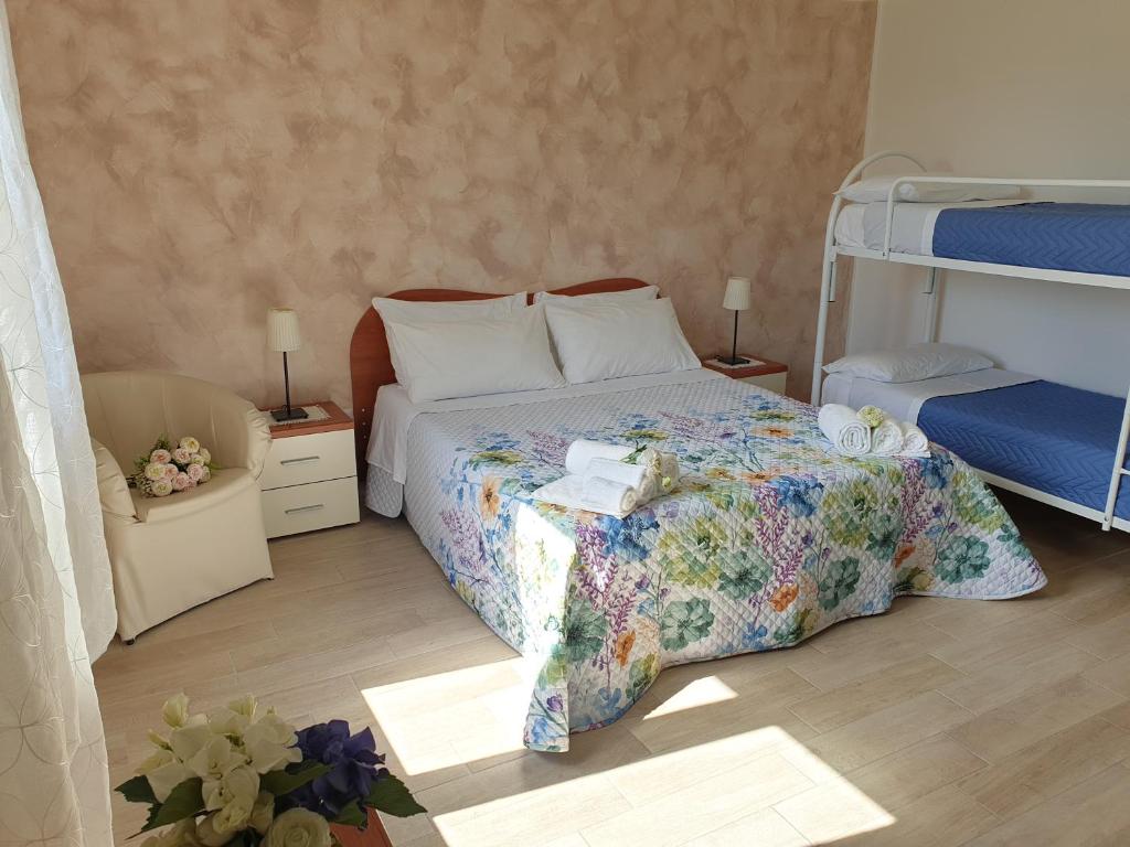 Ένα ή περισσότερα κρεβάτια σε δωμάτιο στο Appartamento vista Vesuvio in B&B