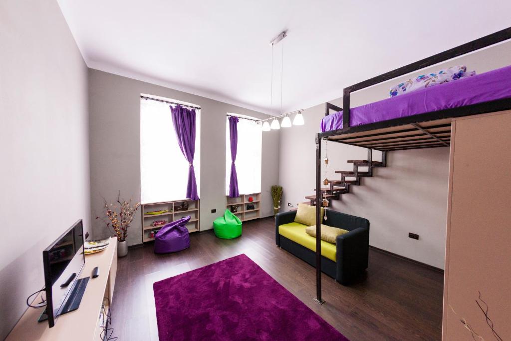 a living room with a bunk bed and a couch at Self Checkin Fully Equipped in Timişoara