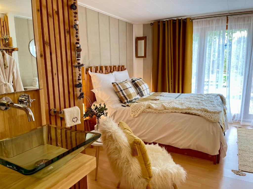 Postel nebo postele na pokoji v ubytování Gîte Les logis du Pech