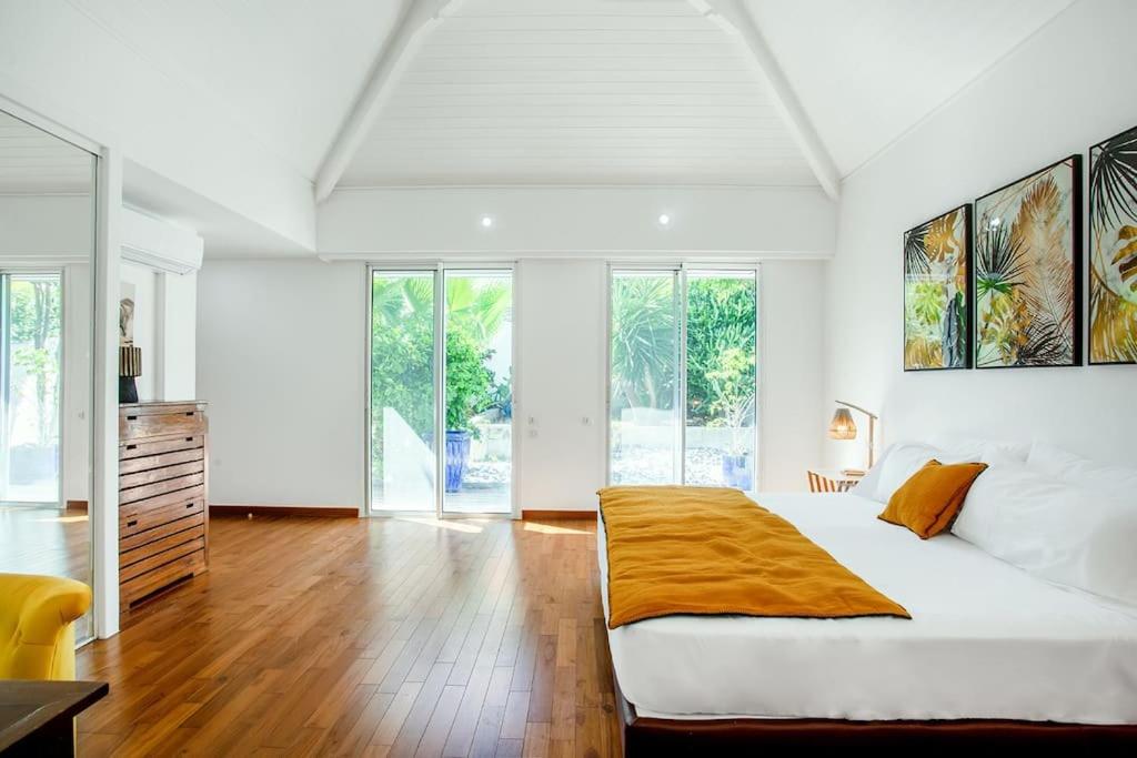 Postel nebo postele na pokoji v ubytování Villa Hanna Green Cay
