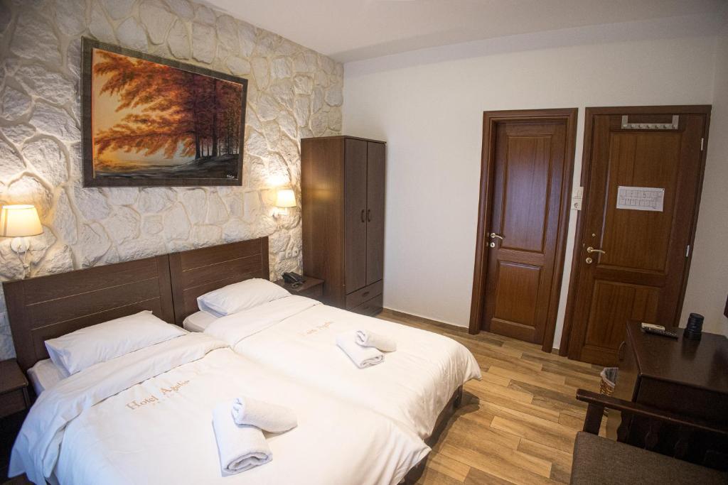 Postel nebo postele na pokoji v ubytování Hotel Agelis
