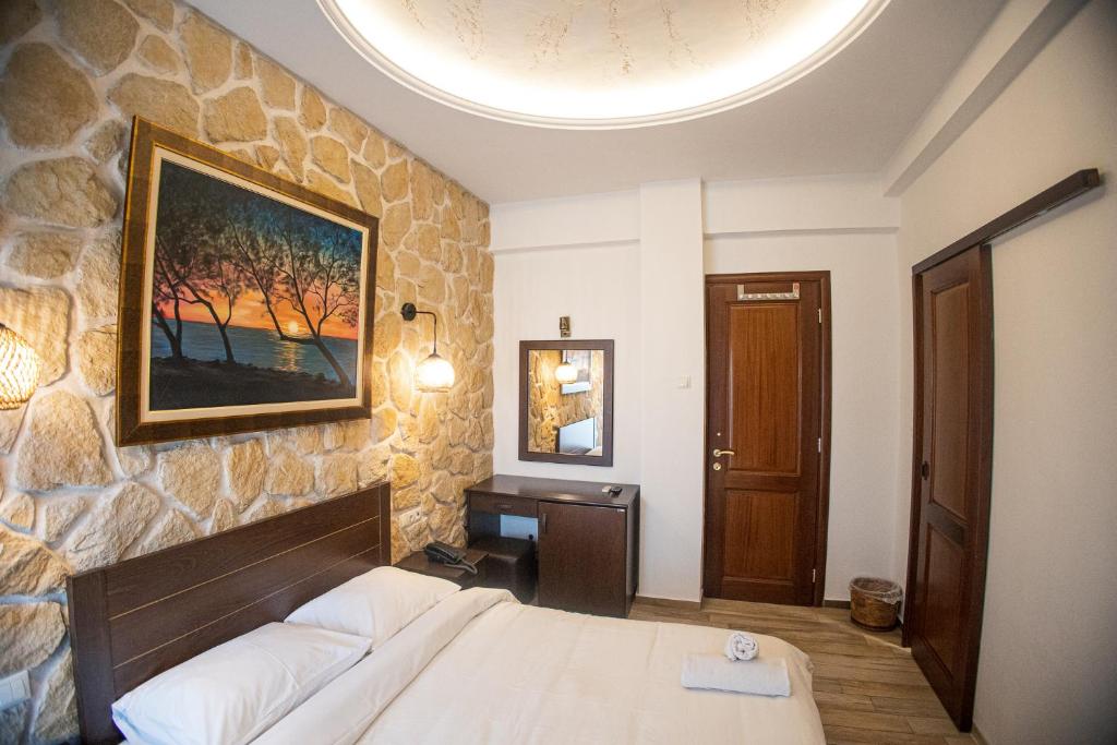 Postel nebo postele na pokoji v ubytování Hotel Agelis