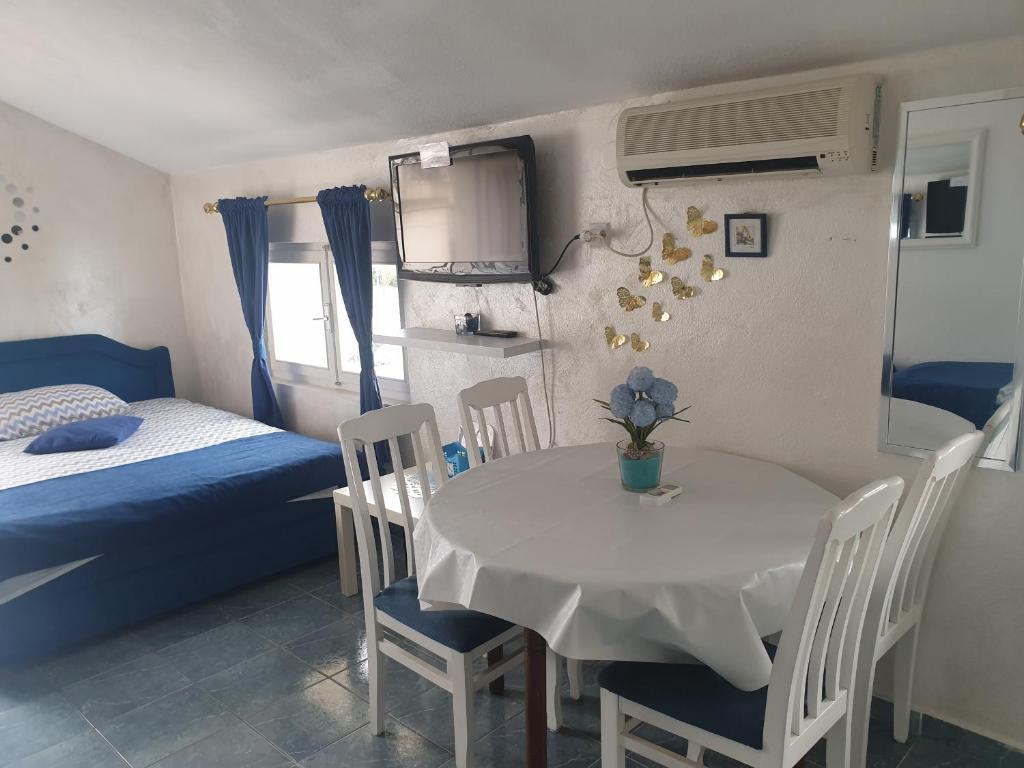 Savić Apartments tesisinde bir odada yatak veya yataklar