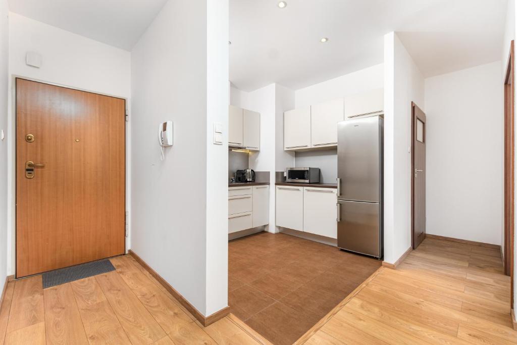 Kuchyň nebo kuchyňský kout v ubytování Apartamenty Piękna 28A by Your Freedom