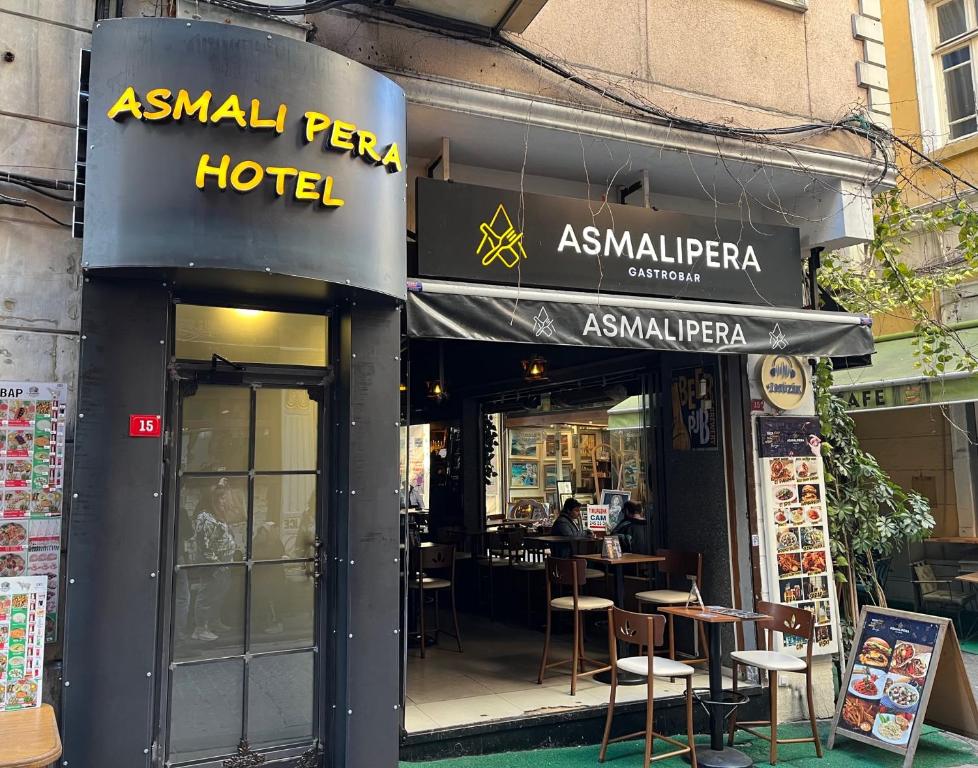 a restaurant with a sign that reads asian peasy hotel at Asmali Pera Hotel in Istanbul