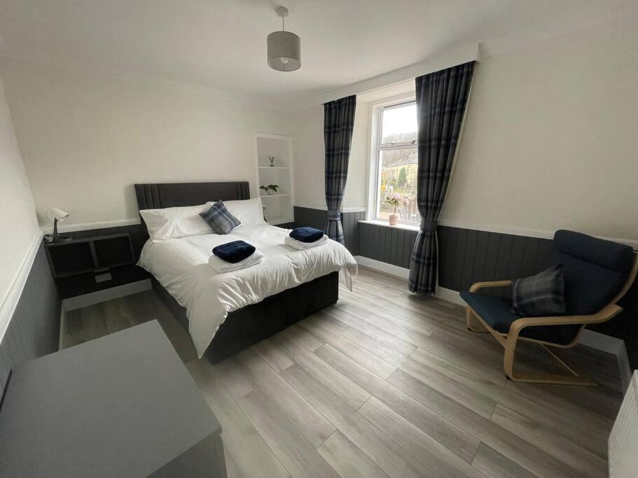 Postel nebo postele na pokoji v ubytování Strathisla Garden Apartment, Oban