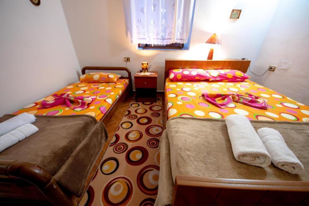 Postel nebo postele na pokoji v ubytování Nina's Guesthouse