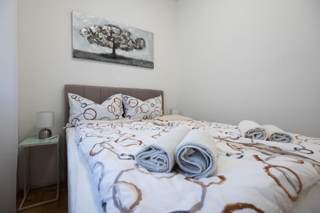 Postel nebo postele na pokoji v ubytování Apartments Batur