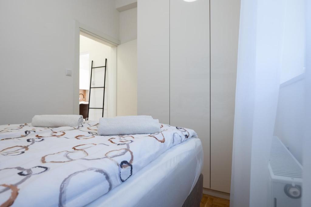Postel nebo postele na pokoji v ubytování Apartments Batur