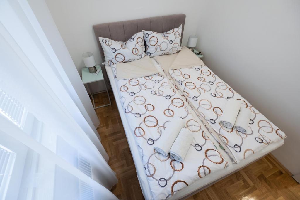 Postel nebo postele na pokoji v ubytování Apartments Batur