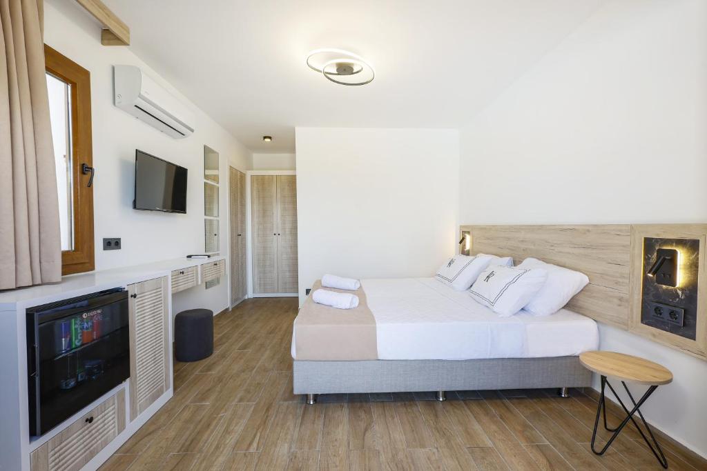 TV a/nebo společenská místnost v ubytování Bodrum Vera Hotel