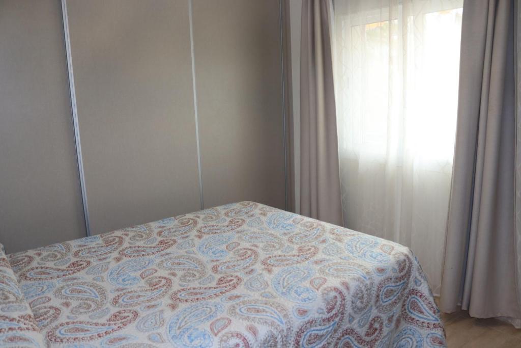 Postel nebo postele na pokoji v ubytování Apartamentos Carihuela Playa, Acogedor, Wifi y Fibra Optica