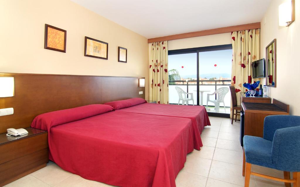 TV a/nebo společenská místnost v ubytování Hotel Puente Real