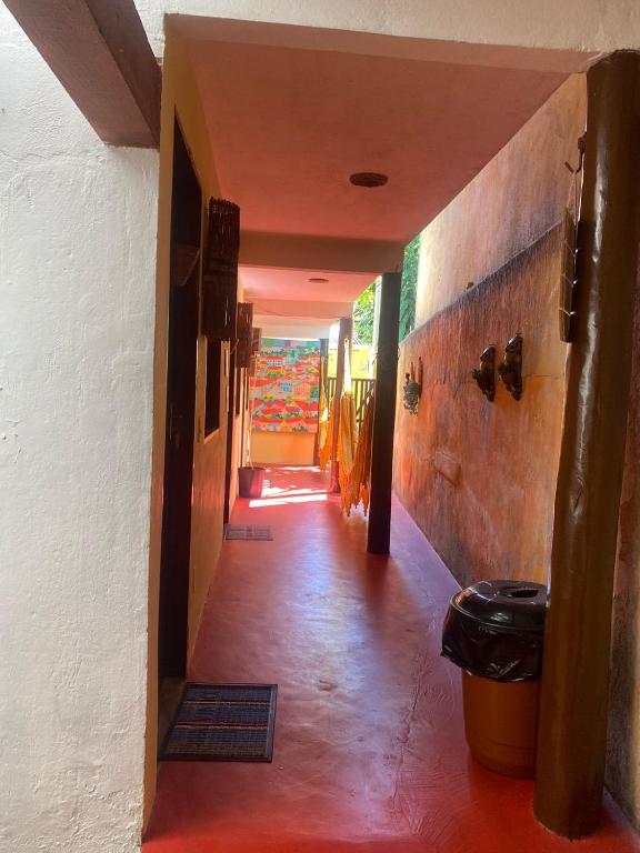 a hallway leading to a room with at Pousada Pituba in Itacaré