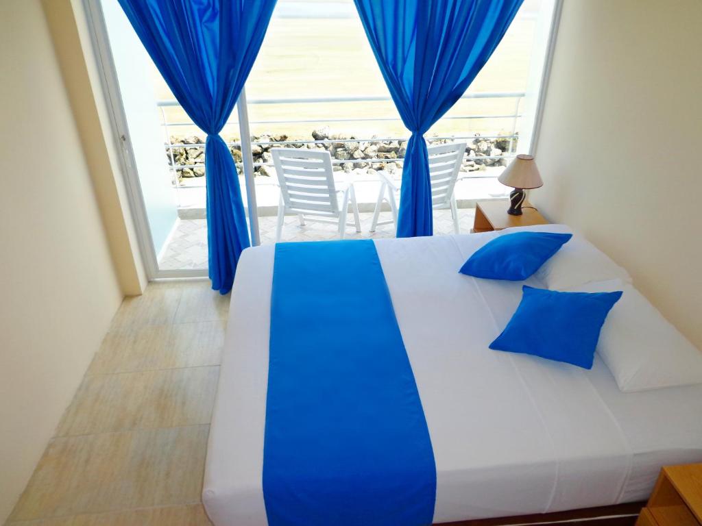 Postel nebo postele na pokoji v ubytování Hotel Crucero