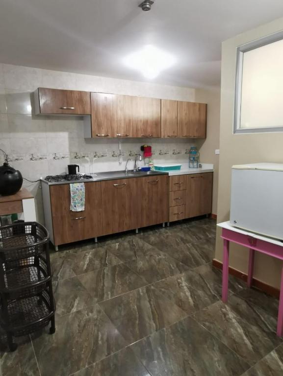Kuchyň nebo kuchyňský kout v ubytování Habitaciones en Acogedora estancia en pleno centro de Ibagué