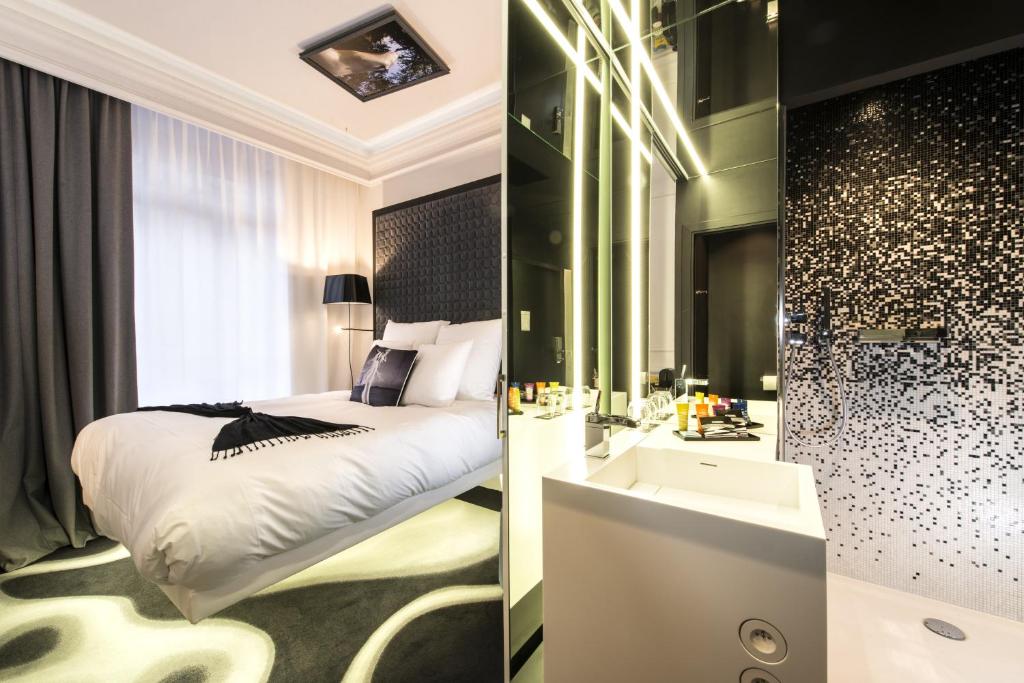 Un ou plusieurs lits dans un hébergement de l'établissement Vertigo | a Member of Design Hotels™