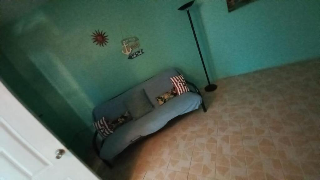 Postel nebo postele na pokoji v ubytování Castaways Villa
