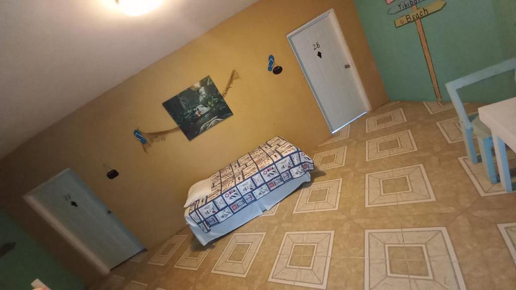 Postel nebo postele na pokoji v ubytování Castaways Villa