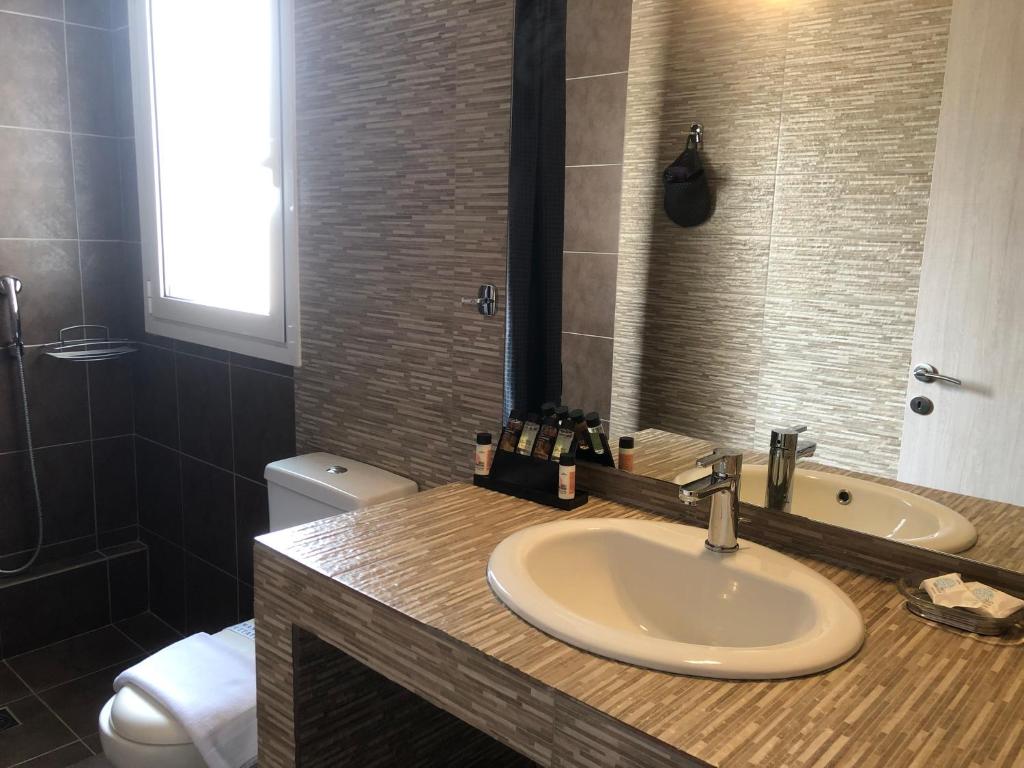 Koupelna v ubytování Connect Suites