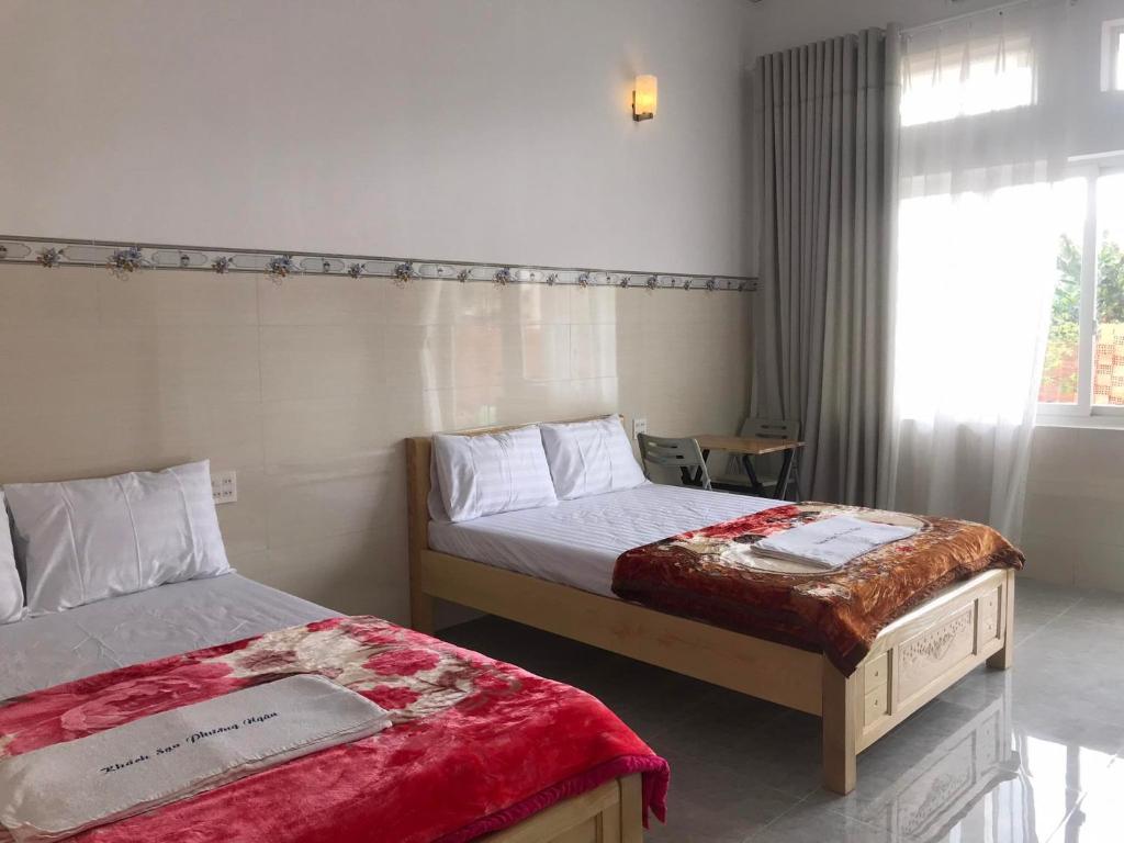 Katil atau katil-katil dalam bilik di Phuong Ngan Guesthouse
