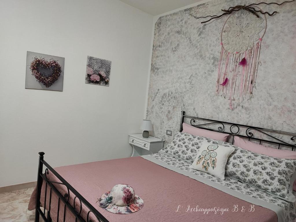 Letto o letti in una camera di L' acchiappasogni