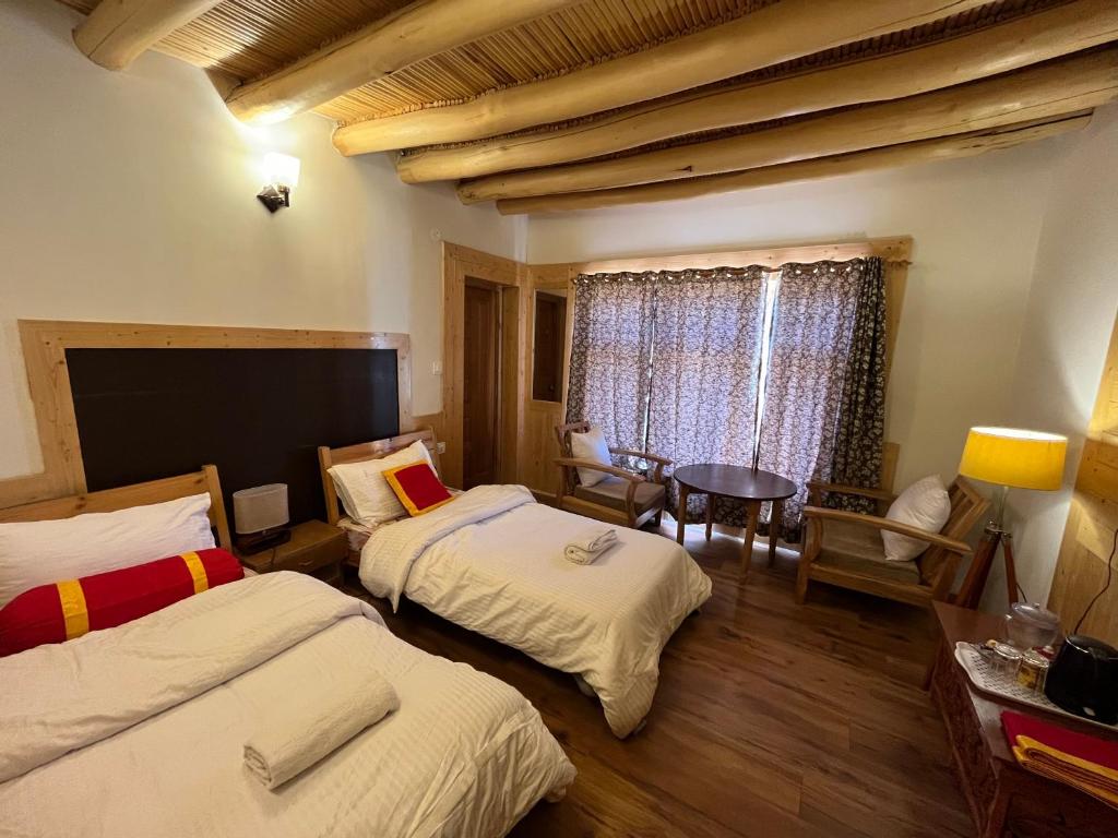 Postel nebo postele na pokoji v ubytování Namra Villa