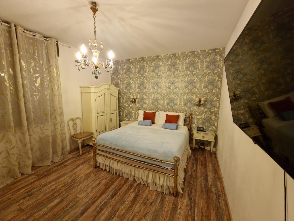 Postel nebo postele na pokoji v ubytování Ciao Verona Bed and Kitchen