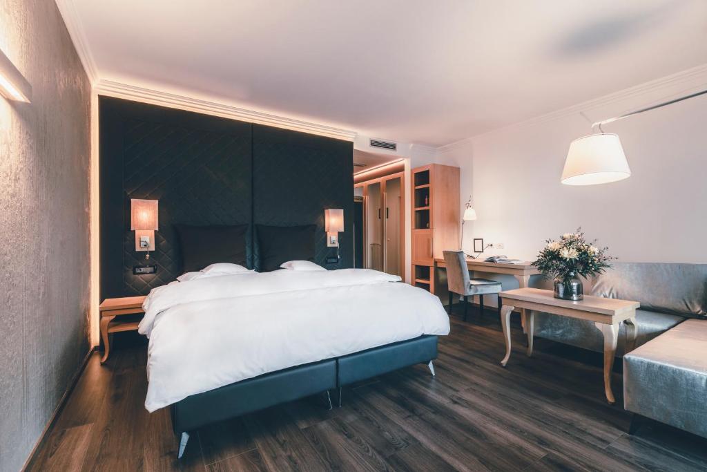 Postel nebo postele na pokoji v ubytování Golserhof
