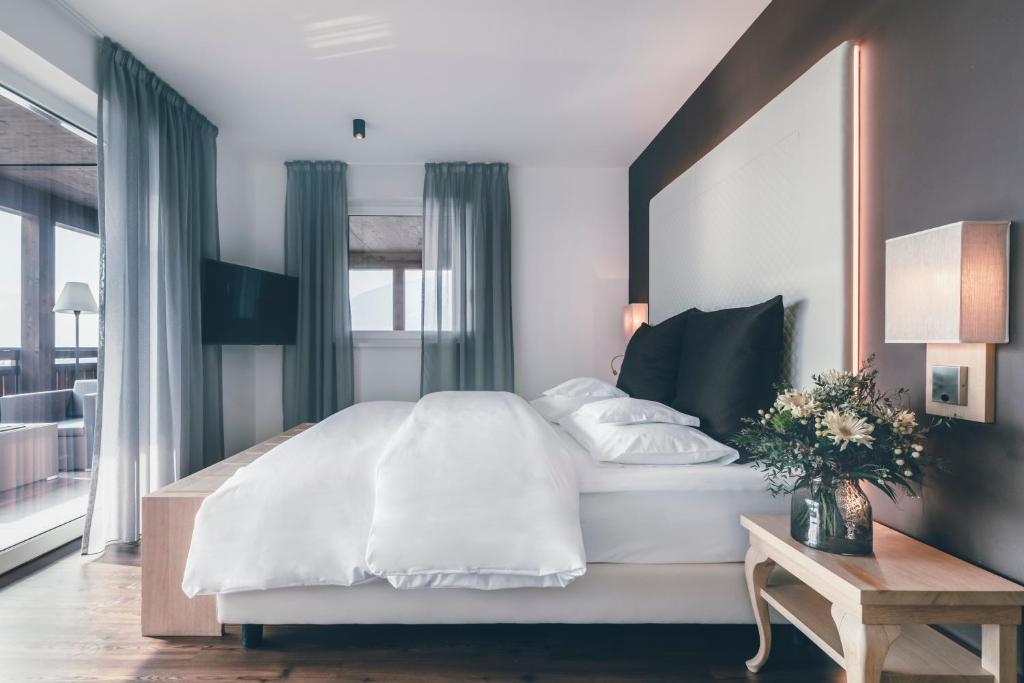 Postel nebo postele na pokoji v ubytování Golserhof