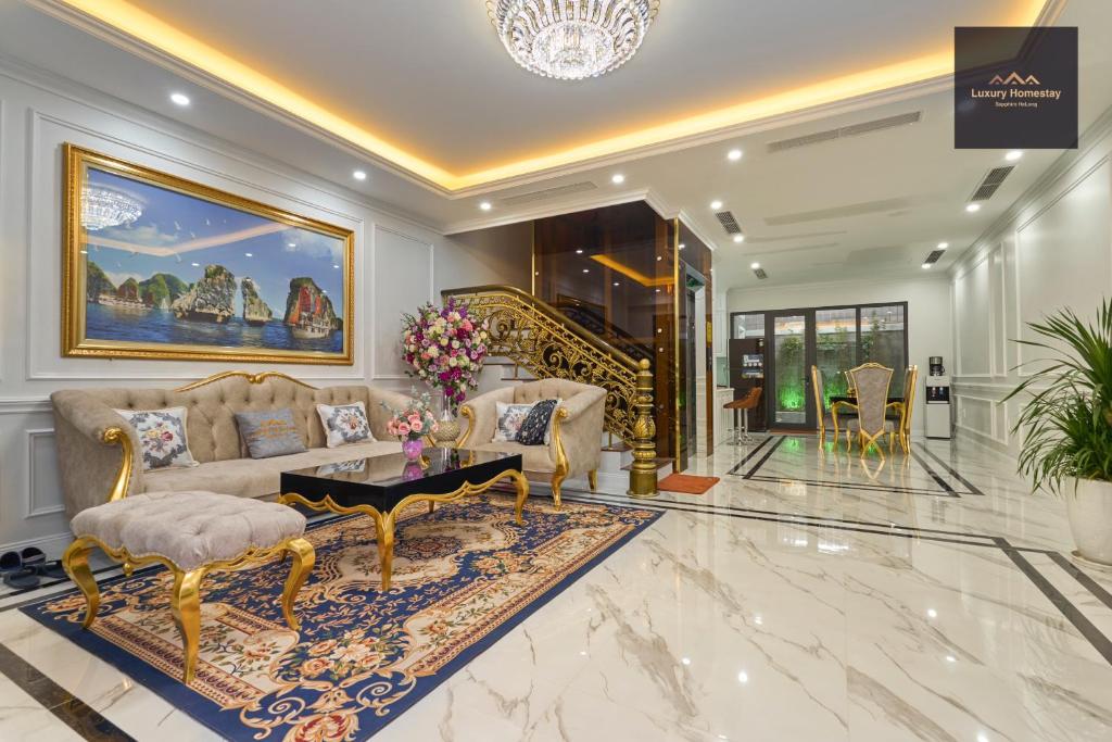 a living room with a couch and a table at Luxury Homestay Vinhomes Dragonbay Hạ Long in Ha Long