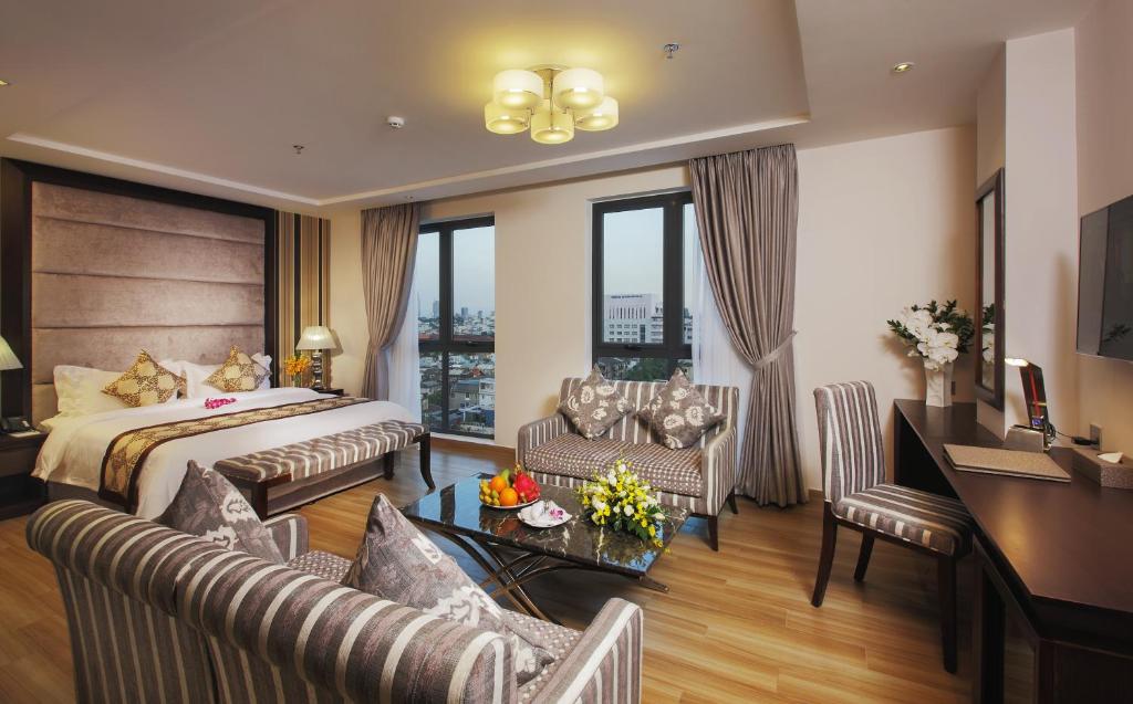 Postel nebo postele na pokoji v ubytování Athena Hotel