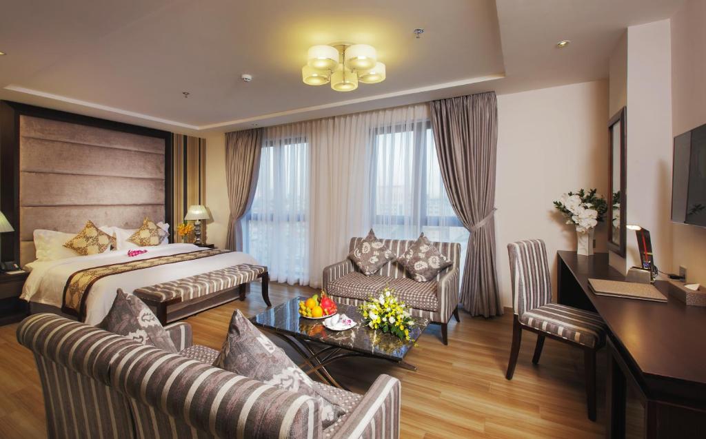 TV a/nebo společenská místnost v ubytování Athena Hotel