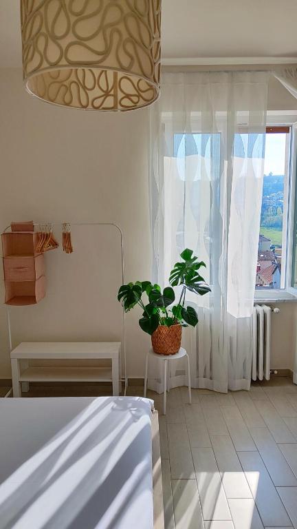 Postel nebo postele na pokoji v ubytování B&B Le Albarelle