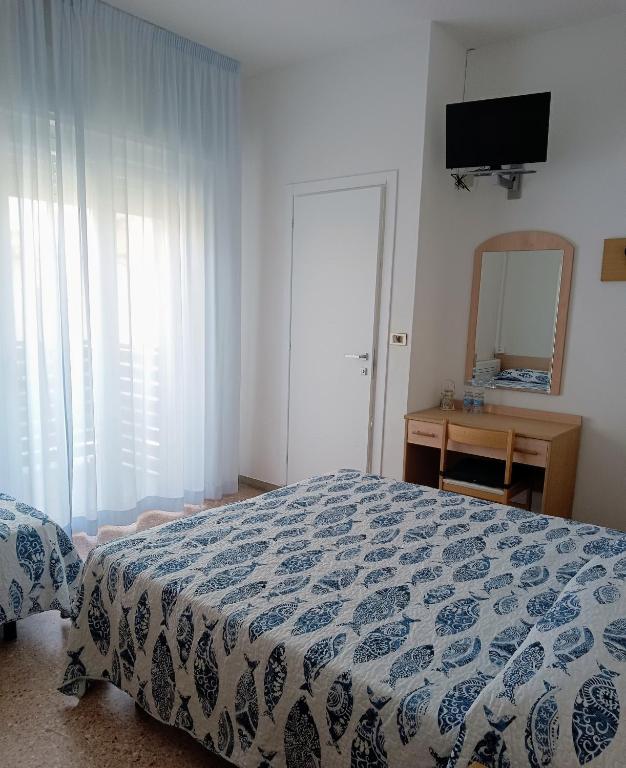 Postel nebo postele na pokoji v ubytování Ninfea rooms