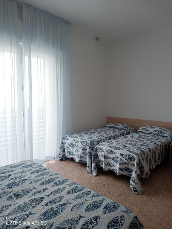 Postel nebo postele na pokoji v ubytování Ninfea rooms