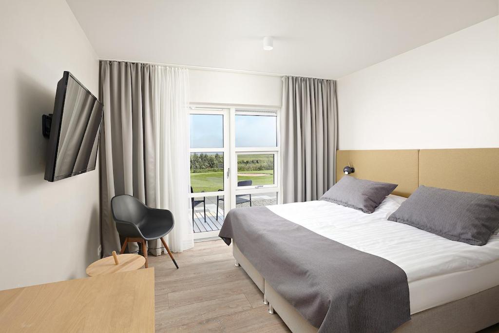 Postel nebo postele na pokoji v ubytování Hotel Hamar