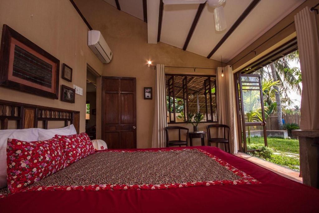 Postel nebo postele na pokoji v ubytování An Villa boutique resort
