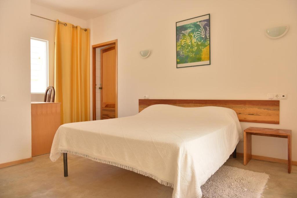 Postel nebo postele na pokoji v ubytování Residencial Che Guevara Bed & Breakfast