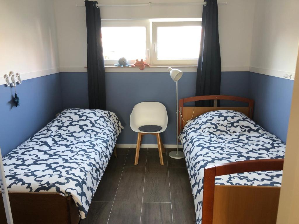 Postel nebo postele na pokoji v ubytování 't Achterom